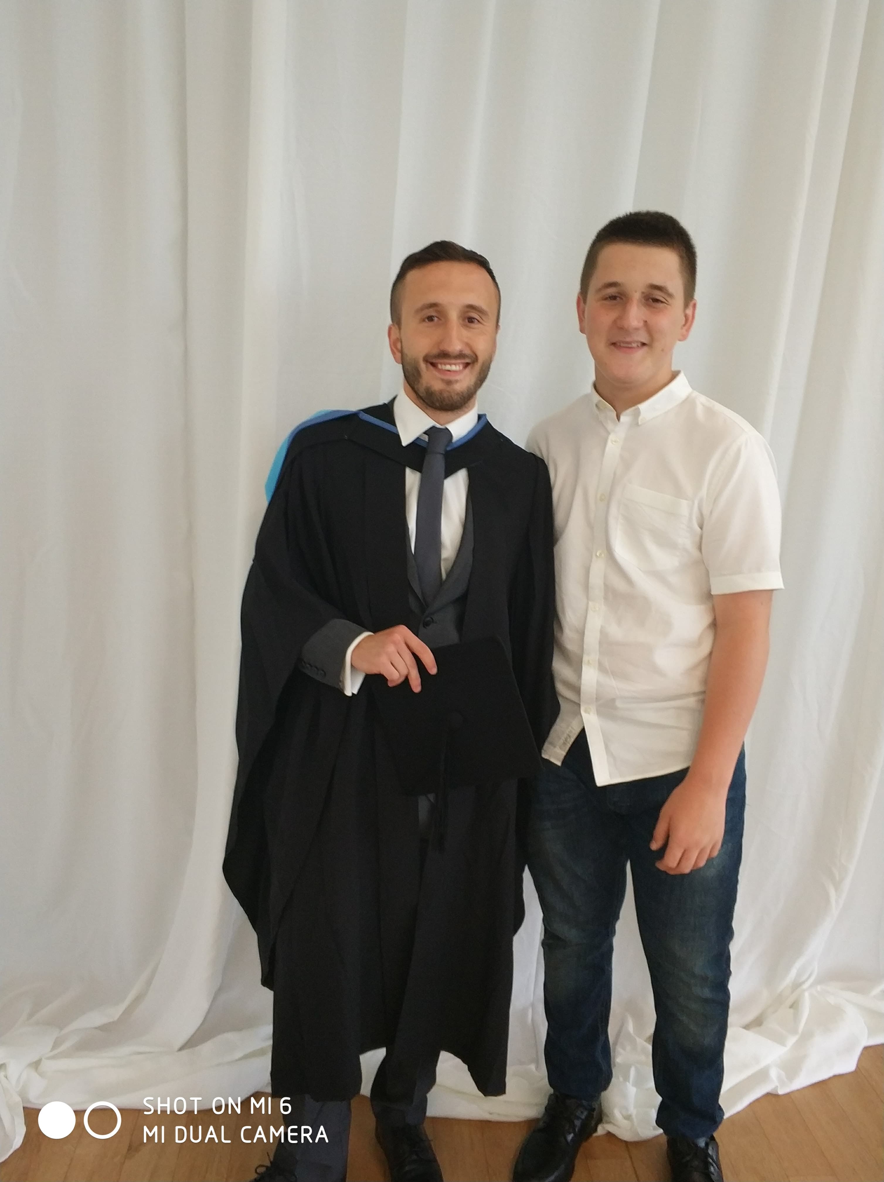 Leon Kercova and his brother Shemsi Kercova at graduation.