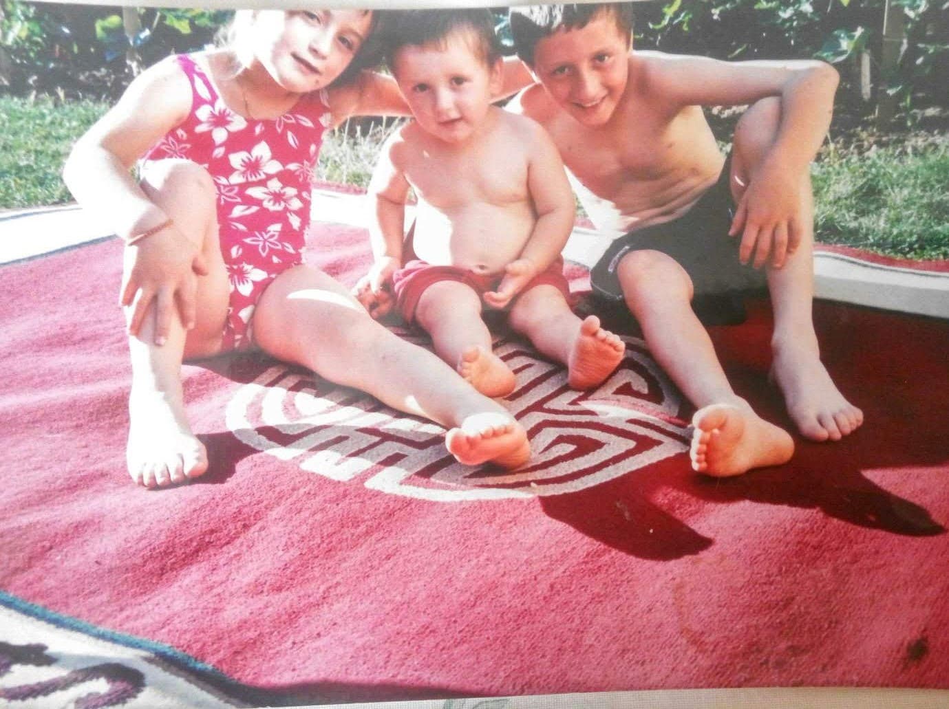 Leon Kercova as a child with his siblings, including his brother Shemsi Kercova.